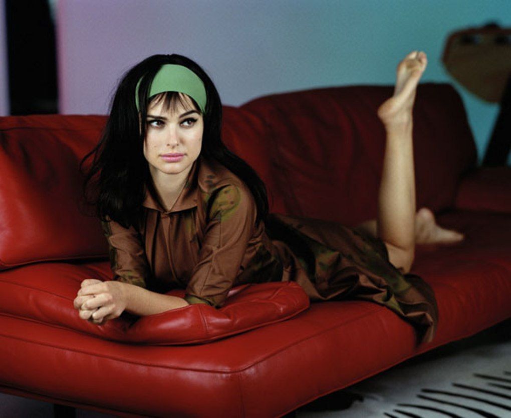 This is a landscape image with resolution 1020x835, dominant color maroon, approximately 1 main objects, containing one person.