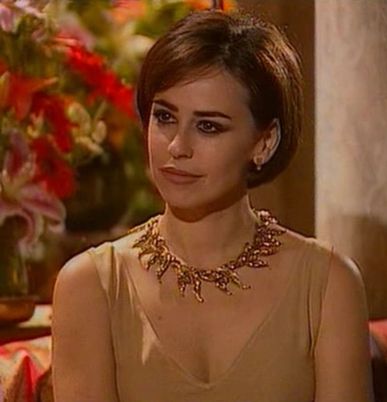 This is a portrait image with resolution 797x829, dominant color olive, approximately 1 main objects, containing one person.